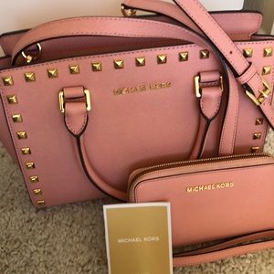 Rare Michael Kors Pink purse with matching wallet.